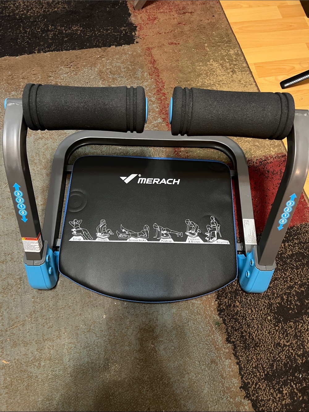 Blue and Black Abdominal Exercise Machine